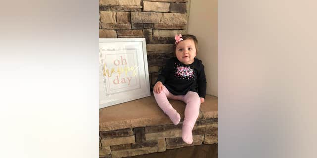 Molly Hughes posed for photos to celebrate beating cancer.