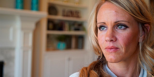 Kacey Ruegsegger Johnson poses for a portrait at her home in Cary, N.C., in late March. (AP)