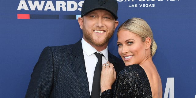 Cole Swindell (L) and Barbie Blank attend the 54th Academy Of Country Music Awards at MGM Grand Garden Arena on April 07, 2019 in Las Vegas, Nevada.