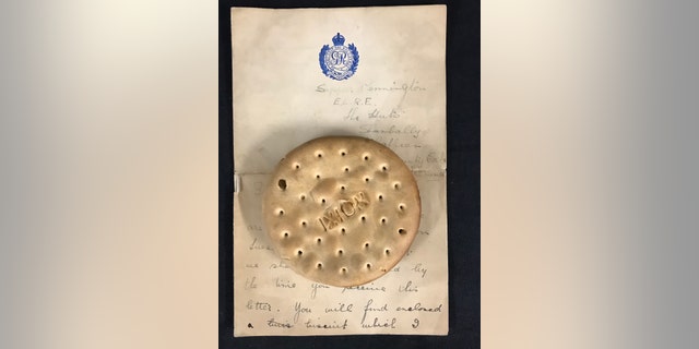 The hardtack biscuit was recovered from one of Lusitania's lifeboats. (Henry Aldridge and Son)