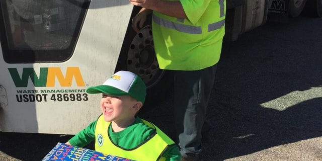"He doesn't like trash, he cleans up all day long," Ethan's mother said.