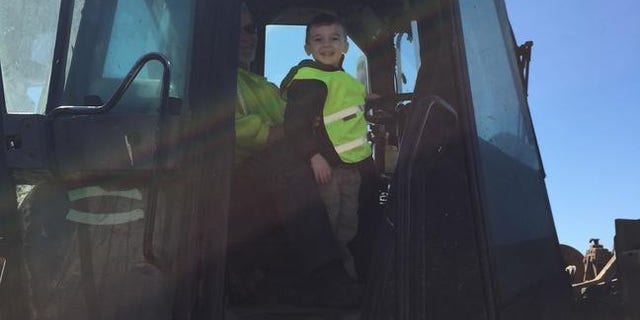Pictures from Ethan’s big day also show him touring the area’s local Waste Management facility.