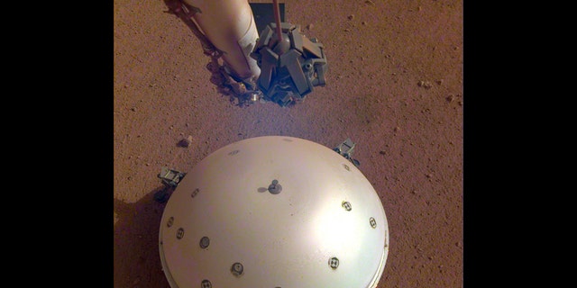 This image of InSight's seismometer was taken on the 110th Martian day, or sol, of the mission. The seismometer is called Seismic Experiment for Interior Structure, or SEIS. (Credit: NASA/JPL-Caltech)