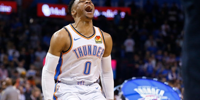 Oklahoma City Thunder guard Russell Westbrook (0) runs out and roars to the crowd before an NBA basketball game against the Los Angeles Lakers Tuesday, April 2, 2019, in Oklahoma City.