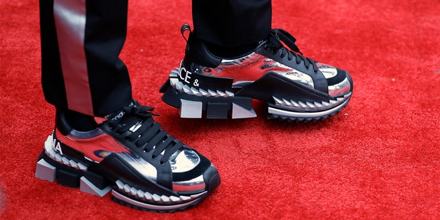 Georgia defensive back DeAndre Baker walks the red carpet ahead of the first round at the NFL football draft, Thursday in Nashville, Tenn. (AP Photo/Steve Helber)