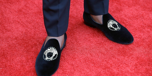 Kentucky linebacker Josh Allen walks the red carpet ahead of the first round at the NFL football draft, Thursday in Nashville, Tenn. (AP Photo/Steve Helber)