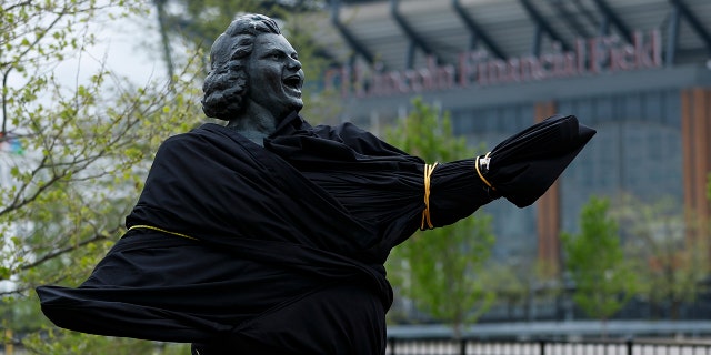 The statue of singer Kate Smith, partially covered, is seen near the Wells Fargo Center on Friday, April 19, 2019 in Philadelphia. (AP Photo / Matt Slocum)