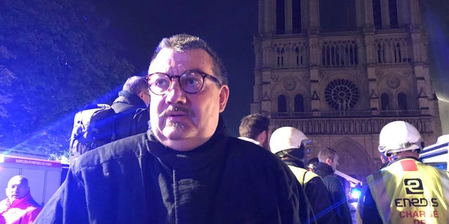 Jean-Marc Fournier, the chaplain of the Paris Fire Brigade, was credited with saving relics.