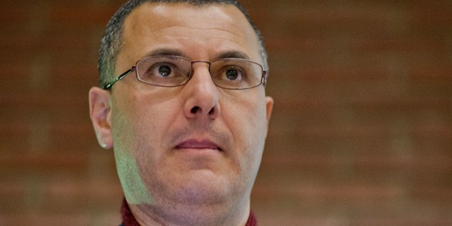Palestinian researcher, commentator, and human rights activist Omar Barghouti speaks during a conference at the ULB university in Brussels, on April 30, 2013. ( ERIC LALMAND/AFP/Getty Images)