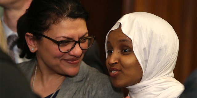 ​​​​​​​U.S. Reps. Rashida Tlaib, D-Mich., left, and Ilhan Omar, D-Minn., at a news conference in Washington, March 13, 2019. (Getty Images)