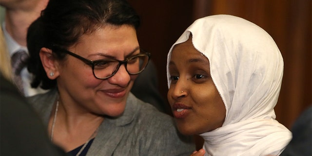U.S. Reps. Rashida Tlaib, D-Mich., left, and Ilhan Omar, D-Minn., at a news conference in Washington, March 13, 2019. (Getty Images)