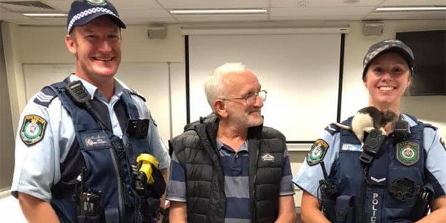 Police posed with the rat after it was reunited with its owner.