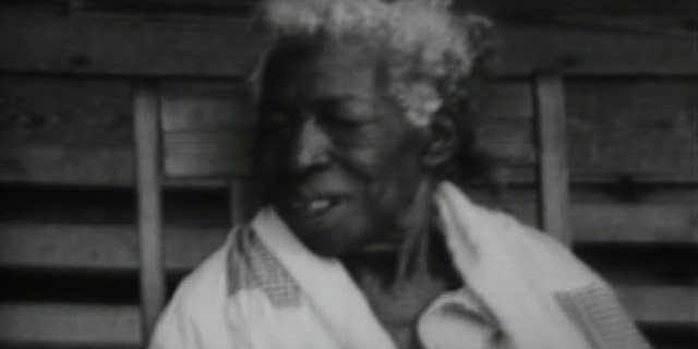 Redoshi, described as "Aunt Sally Smith," appeared briefly in a 1930s public information film entitled “the Negro Farmer” that was produced by the U.S. Department of Agriculture.
