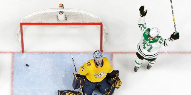 Dallas Stars right wing Alexander Radulov (47), of Russia, reacts after scoring his second goal against Nashville Predators goaltender Pekka Rinne (35), of Finland, during the second period in Game 5 of an NHL hockey first-round playoff series Saturday, April 20, 2019, in Nashville, Tenn. (AP Photo/Mark Humphrey)