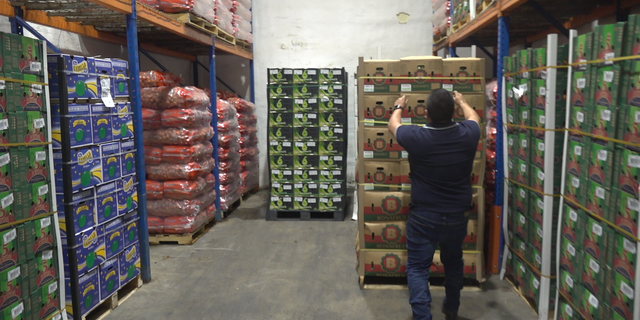 Carlos Ayala, Amore Produce owner, shows Fox News produce refrigerated stockroom