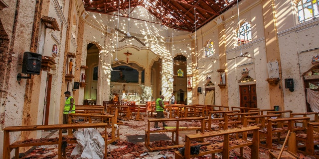 Debris inside St. Sebastian's Church after a blast in Negombo, north of Colombo, Sri Lanka, Sunday. (Associated Press)