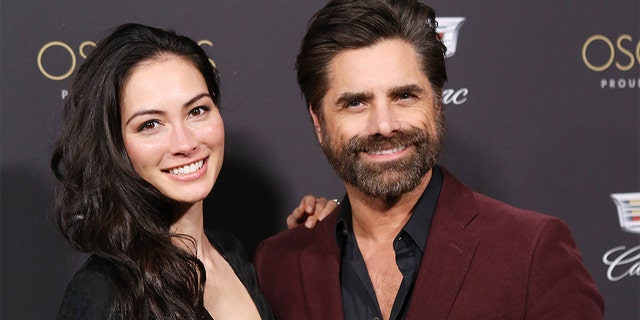 John Stamos and his wife Caitlin McHugh reportedly had quite the experience in the moments leading up to their son’s birth last year.