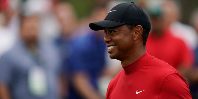 Tiger Woods Headed to Augusta – Playing in 2022 Masters a “Game-Time Decision” 1 Tiger Woods smiles as he walks off the seventh tee during the final round of the Masters April 14, 2019, in Augusta, Ga.