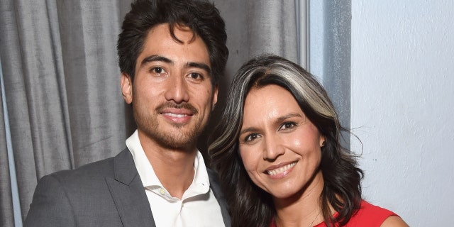 Abraham Williams (L) and Tulsi Gabbard attend the Sean Penn CORE Gala benefiting the organization formerly known as J/P HRO & its life-saving work across Haiti & the world at The Wiltern on January 5, 2019 in Los Angeles, California. (Photo by Michael Kovac/Getty Images for CORE, formerly J/P HRO )
