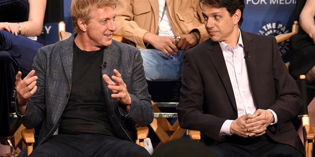 William Zabka, left, and Ralph Macchio speak onstage at the "Cobra Kai" premiere at The Paley Center for Media on April 22 in Beverly Hills, California.