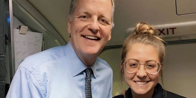 American Airlines CEO Doug Parker (left) with flight attendant Maddie Peters.