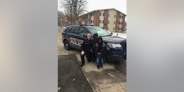 Officer Lynema spotted Thomas Daniels running for his school bus and offered him a ride, with his mom's permission, when the bus didn't stop.