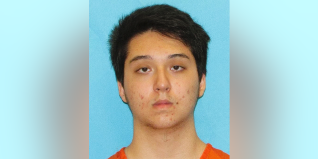 FILE - This 2018 booking file photo provided by the Collin County District Attorney's office in Texas shows Matin Azizi-Yarand, a teenager from Plano, Texas, who has been charged with criminal solicitation of capital murder and making a terroristic threat. The Collin County district attorney's office says Azizi-Yarand had planned to release a "Message to America" explaining the attack. Authorities say he spent more than $1,400 buying weapons and tactical gear, and had been trying to recruit others to help him in a planned shooting. (Collin County District Attorney's office via AP, File)