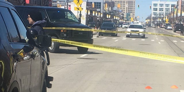 A man was shot in the face and shoulder after a argument on a bus in Detroit over some gym shoes, according to police.
