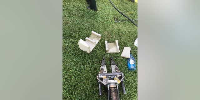 Florida firefighters were forced to use the Jaws of Life after a Rottweiler puppy got her head stuck in a cinder block on Saturday.