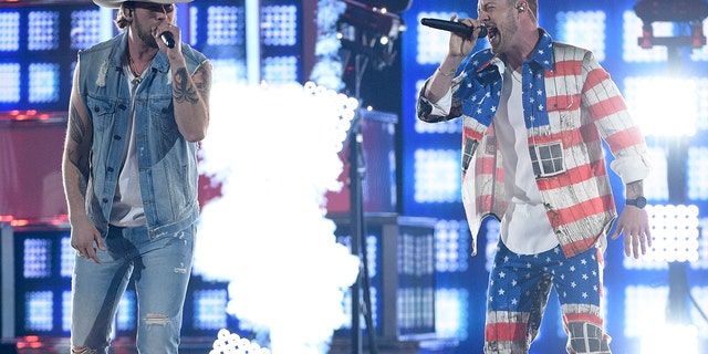 Brian Kelley, left, and Tyler Hubbard, of Florida Georgia Line, perform "Can't Hide Red" at the 54th annual Academy of Country Music Awards at the MGM Grand Garden Arena on Sunday, April 7, 2019, in Las Vegas.