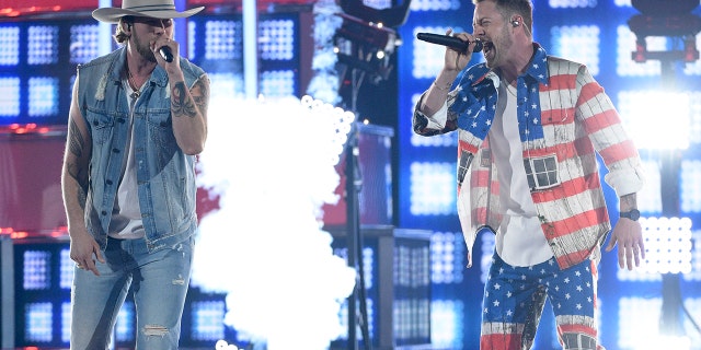 Brian Kelley, left, and Tyler Hubbard, of Florida Georgia Line, perform "Can't Hide Red" at the 54th annual Academy of Country Music Awards at the MGM Grand Garden Arena on Sunday, April 7, 2019, in Las Vegas.