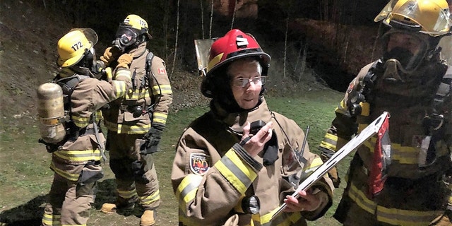 Lester McInally takes on a support role during fire operations.