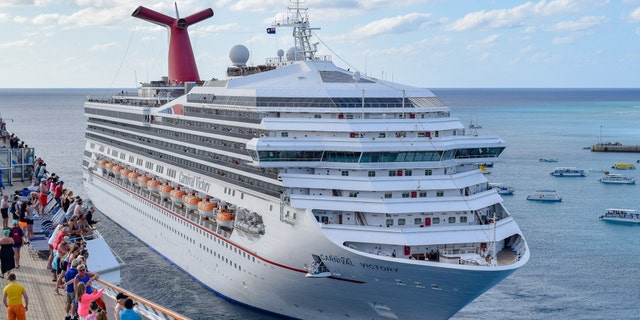Carnival has said there are "two sides" to the story after a passenger claims his group was banned after getting trapped in the elevator.