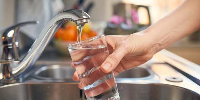 Filling up a glass of water