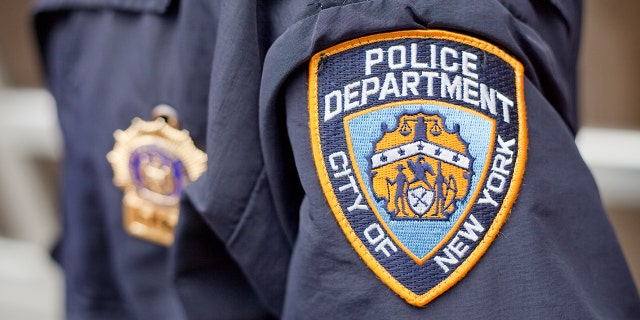 New York City, New York - May 19, 2011 : The crest on the jacket of a New York City Police Officer while on patrol.