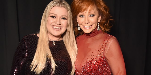 Kelly Clarkson and Reba McEntire attend the 53rd Academy of Country Music Awards at MGM Grand Garden Arena on April 15, 2018 in Las Vegas.