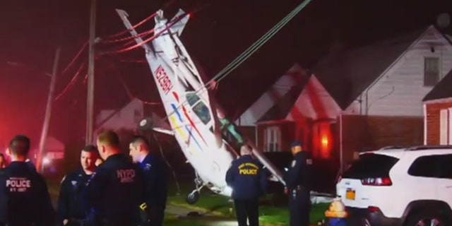 The plane came to a halt only a few feet from the ground.