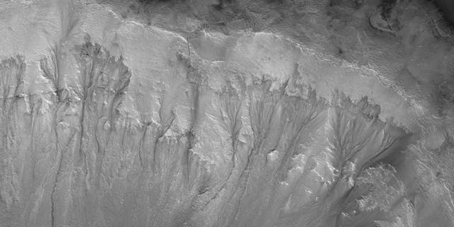 Recurrent Slope Linae on the Palikir Crater walls on Mars. (Credit: NASA/JPL/University of Arizona)