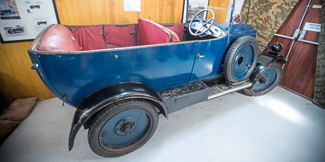 The 1926 Trojan Tourer was successfully hidden inside a vinery shed during WWII after the Germans banned all cars for private use. Cars seized on the island were requisitioned for as little as £1 and moved to France.
