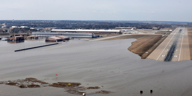 FILE: An aerial view of Offutt Air Force Base and surrounding areas in Nebraska affected by flood waters.