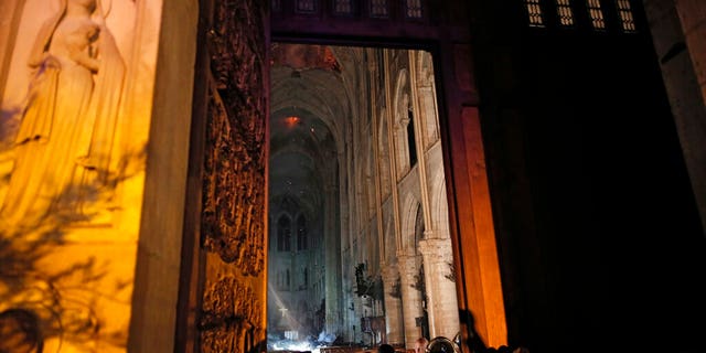 General view from the entrance of Notre Dame cathedral in Paris, Monday, April 15, 2019 after the fire engulfed its upper reaches