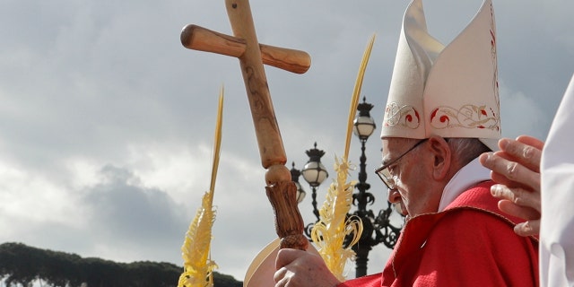 Pope Francis arrives to celebrate Palm Sunday Mass in St. Peter's Square at the Vatican, Sunday, April 14, 2019. The Roman Catholic Church enters Holy Week, retracing the story of the crucifixion of Jesus and his resurrection three days later on Easter Sunday.