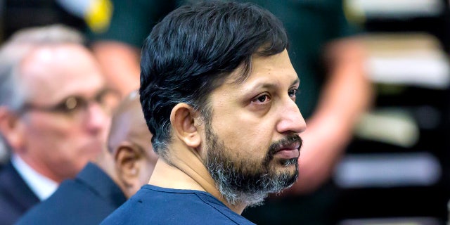 Nouman Raja listens to Deputy Attorney General Adrienne Ellis at his sentencing hearing on Thursday, April 25, 2019, in West Palm Beach, Florida (Associated Press)