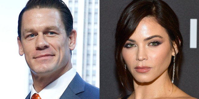 Wrestling pro-John Cena (left) proceeded to ask Jenna Dewan if she would ever consider participating in the WWE. âNever,â she replied. (Getty)