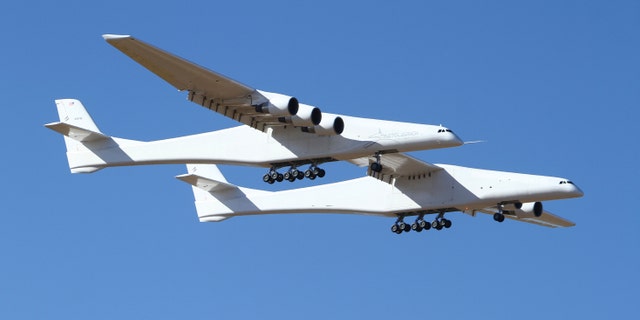 Stratolaunch, a giant six-engine aircraft with the world’s longest wingspan , makes its historic first flight from the Mojave Air and Space Port in Mojave, Calif., Saturday, April 13, 2019.