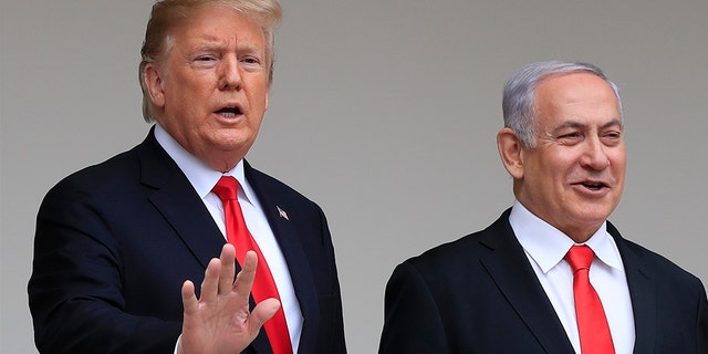 Then President Trump welcomes visiting Israeli Prime Minister Benjamin Netanyahu to the White House in Washington, Monday, March 25, 2019.
