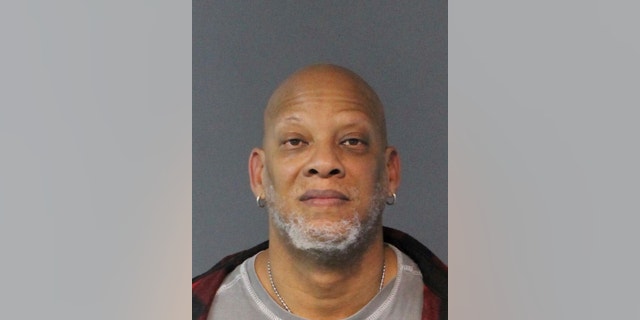 This photo provided by the Washoe County Sheriff's Office, shows Arthur Sewall, 51, a former Las Vegas police officer who was arrested as a suspect in a 1997 murder in southern Nevada, is pictured in this Jan. 11, 2018 booking photo at the Washoe County Jail in Reno provided by the Washoe County Sheriff's Office. He's being held without bail on open murder and sexual assault charges after his arrest last week. (Washoe County Sheriff's Office via AP)