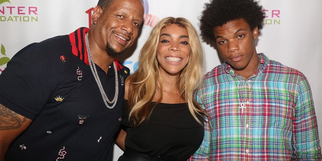 Kevin Hunter, left, Wendy Williams, center, and son Kevin Hunter Jr, right, pose at a celebration for The Hunter Foundation Charity that helps fund programs for families and youth communities in need of help and guidance at Planet Hollywood Times Square on July 11, 2017 in New York City.