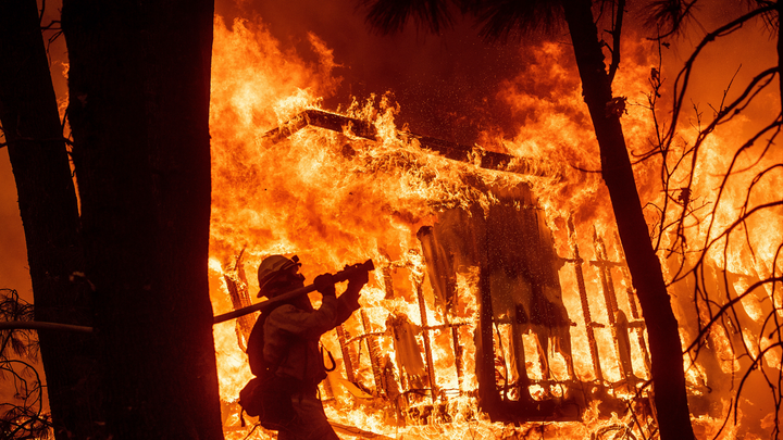 Who is to blame for the massive wildfires in California?