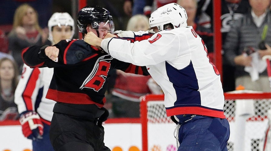 Stanley Cup Playoffs fight between Andrei Svechnikov and Alex